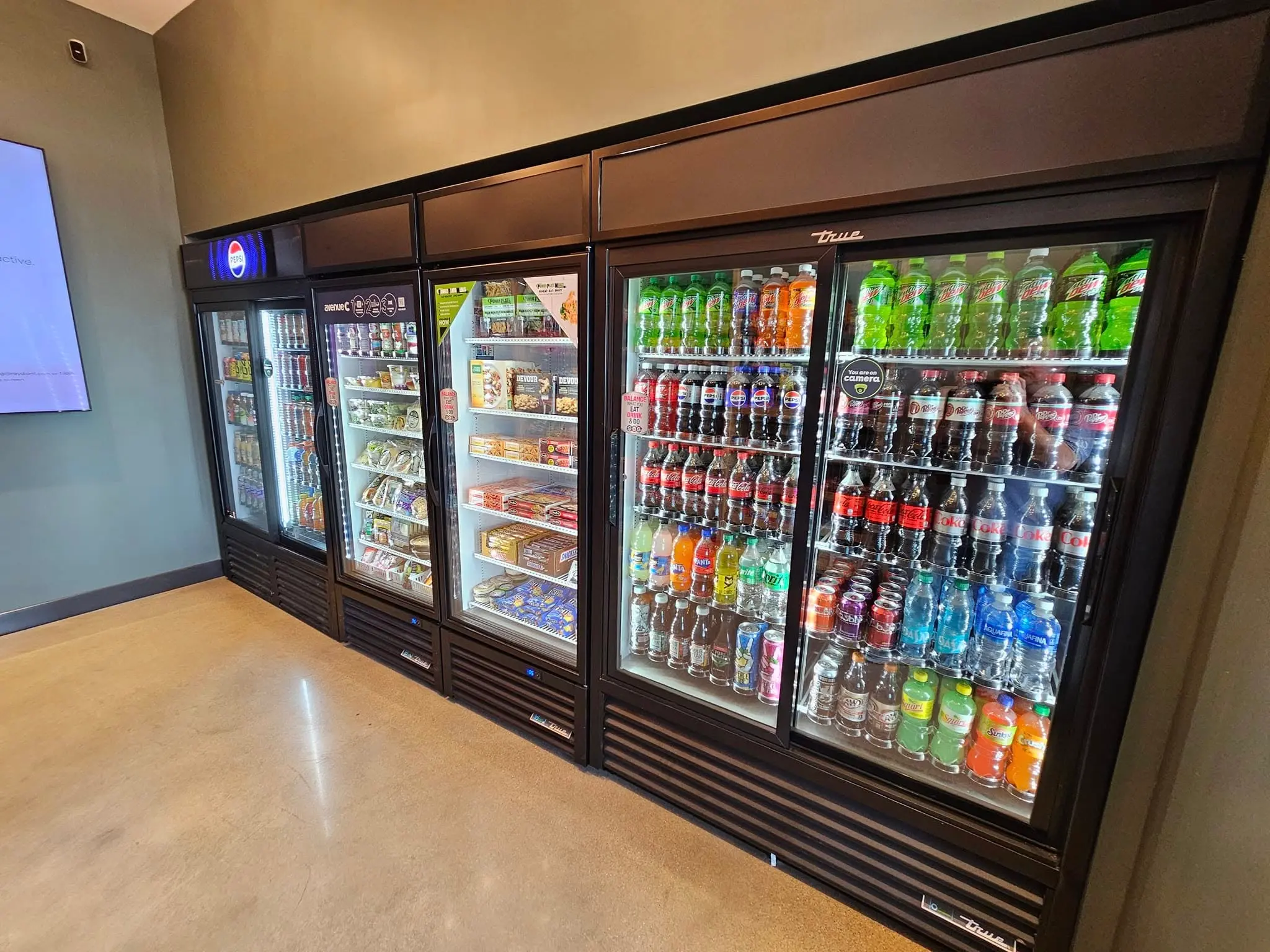 Micro market cooler wall installed by JC Supply Co